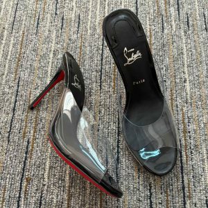 Christian Louboutin Mules Just Arch 100 mm en cuir verni et PVC noir