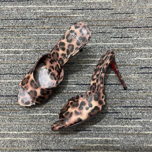 Christian Louboutin Mules Me Dolly 100 mm en cuir pony imprimé léopard kitty