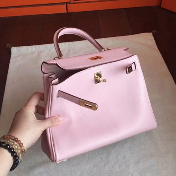 Réplique Haute Qualité Sac à main Hermès Kelly Retourne 28cm Rose Dragée Swift – Image 6