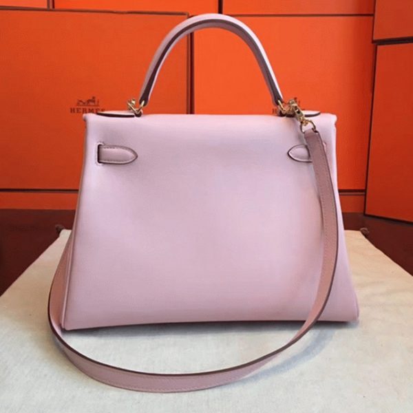 Contrefa?on Sac à main Hermès Kelly Retourne 32cm Rose Dragée Swift – Image 3