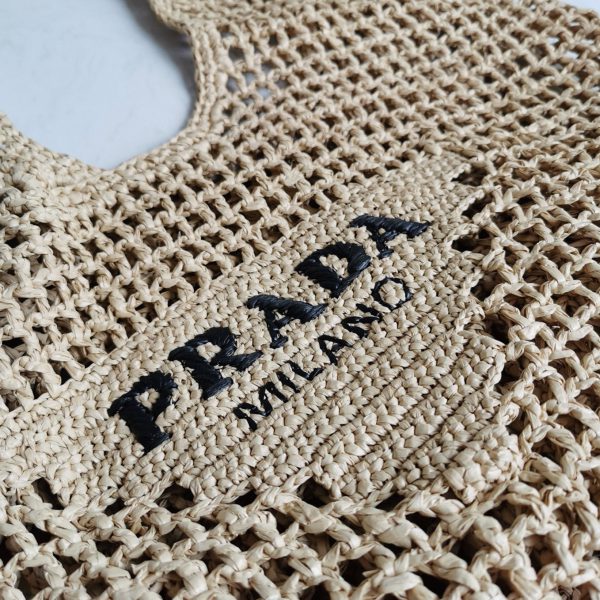 Contrefaçon grand cabas Prada en raphia tressé beige – Image 3
