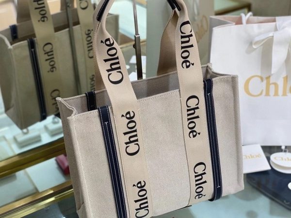 Contrefaçon Chloe Sac Cabas Woody Moyen en toile avec bandes en cuir bleu – Image 2