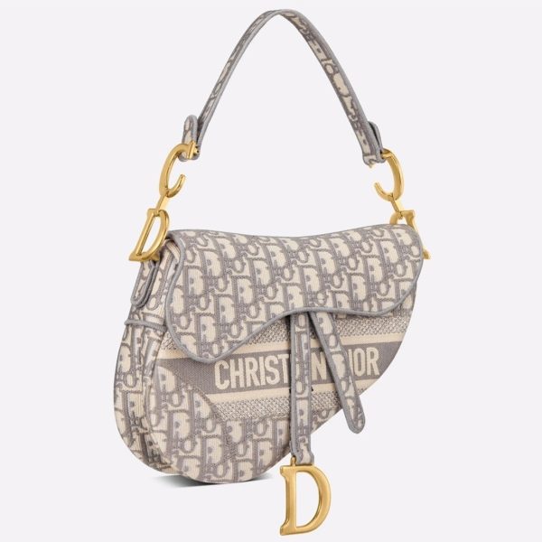 Contrefaçon Sac Saddle Dior en broderie Oblique grise